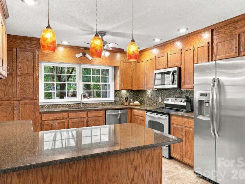 31883 Ameron Circle, Albemarle, NC 28001.  MLS# CAR4426721, YatesRealty ID 53423. Another view of the kitchen.