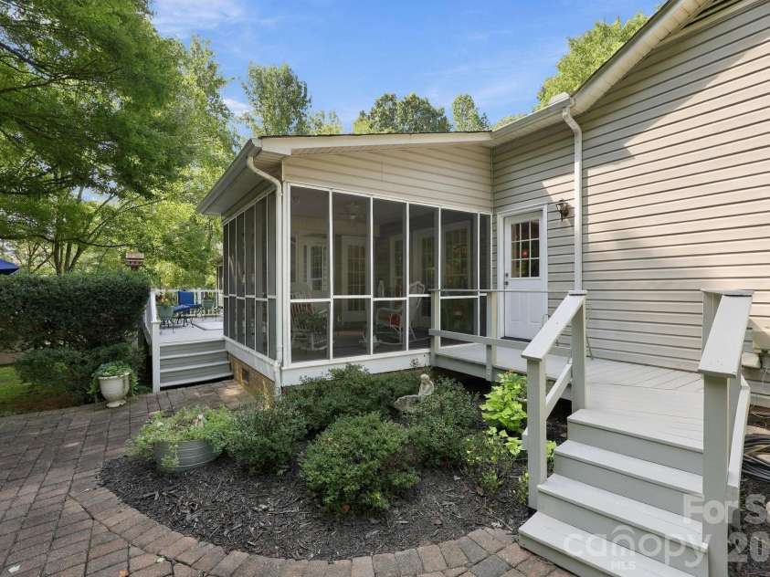 31883 Ameron Circle, Albemarle, NC 28001.  MLS# CAR4426721, YatesRealty ID 53423. Nice landscaping makes the backyard an inviting space to enjoy.
