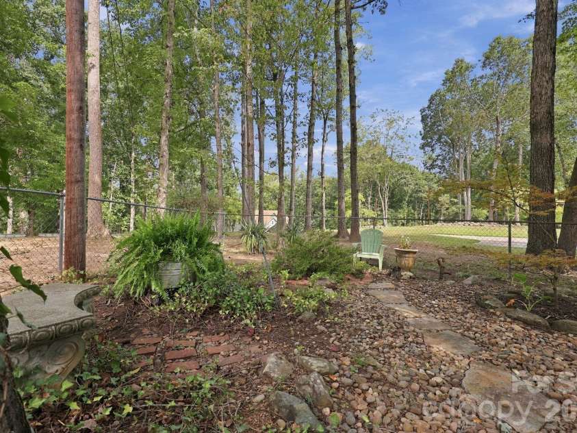 31883 Ameron Circle, Albemarle, NC 28001.  MLS# CAR4426721, YatesRealty ID 53423. The backyard is fully fenced in.