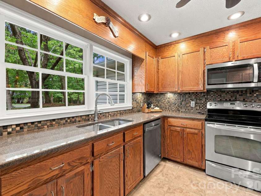 31883 Ameron Circle, Albemarle, NC 28001.  MLS# CAR4426721, YatesRealty ID 53423. The kitchen has a well planned design for cooking and entertaining.