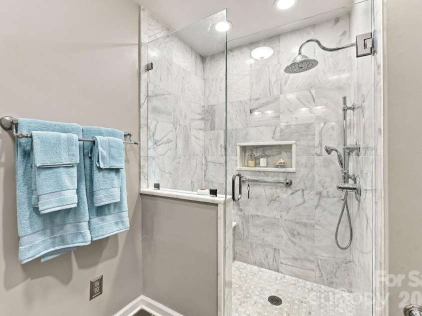 31883 Ameron Circle, Albemarle, NC 28001.  MLS# CAR4426721, YatesRealty ID 53423. There is a large tile shower in the primary bathroom.