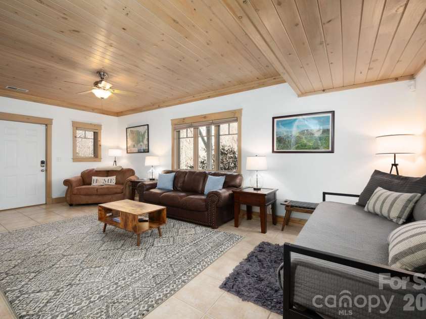 18 Wood Haven Lane, Black Mountain, NC 28711.  MLS# CAR4428632, YatesRealty ID 53432. Basement Ideal for TV or Guest Space