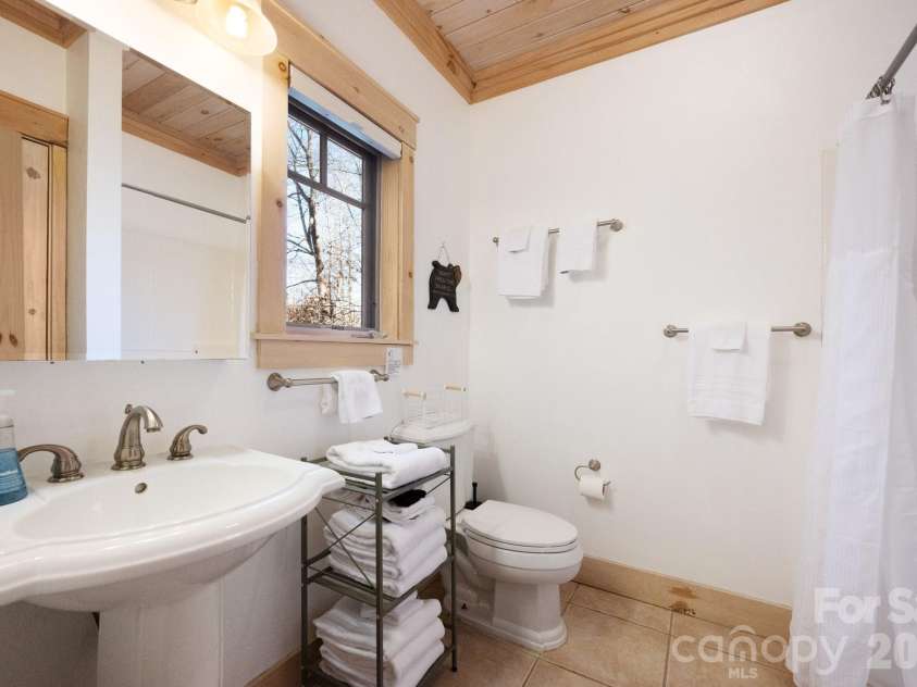 18 Wood Haven Lane, Black Mountain, NC 28711.  MLS# CAR4428632, YatesRealty ID 53432. Basement Includes a Full Bath