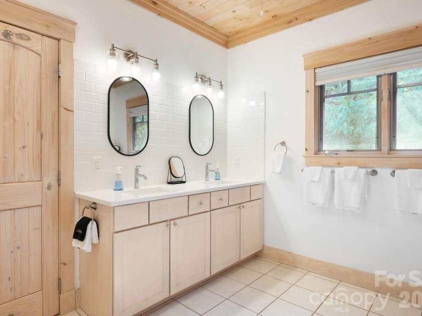 18 Wood Haven Lane, Black Mountain, NC 28711.  MLS# CAR4428632, YatesRealty ID 53432. Ensuite Bath Features Double Vanity