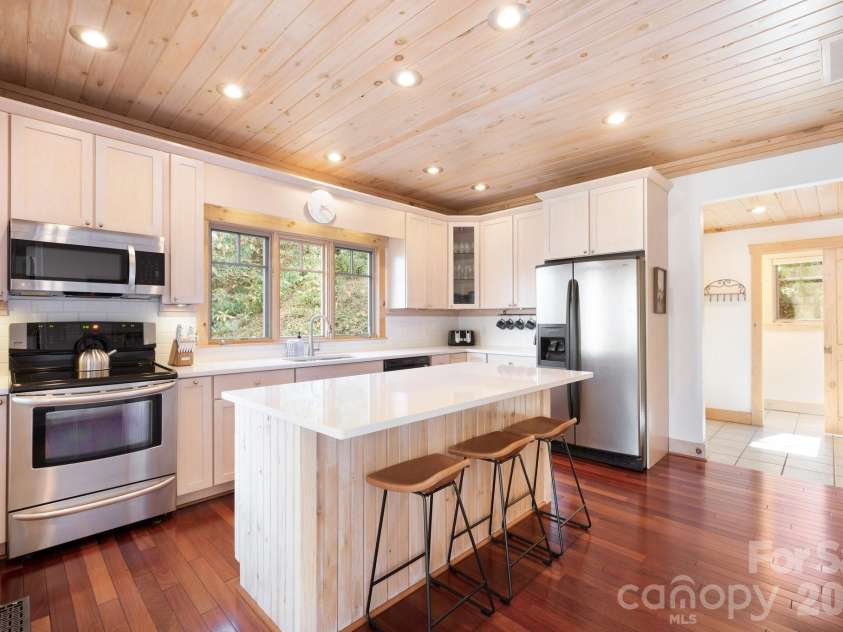 18 Wood Haven Lane, Black Mountain, NC 28711.  MLS# CAR4428632, YatesRealty ID 53432. Spacious Kitchen with Eat-In Island