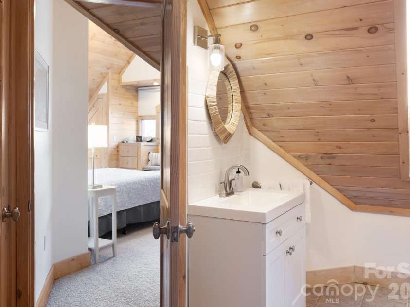 18 Wood Haven Lane, Black Mountain, NC 28711.  MLS# CAR4428632, YatesRealty ID 53432. Two Separate Vanities in Upstairs Bath