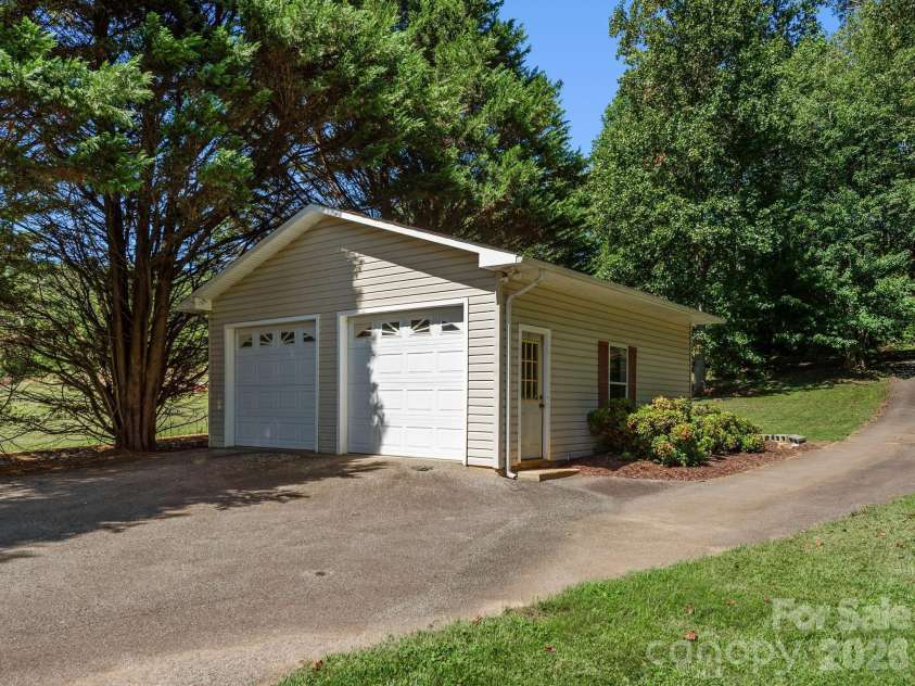 1308 Charlotte Highway, Fairview, NC 28730.  MLS# CAR4429052, YatesRealty ID 53437. 2 car detached garage