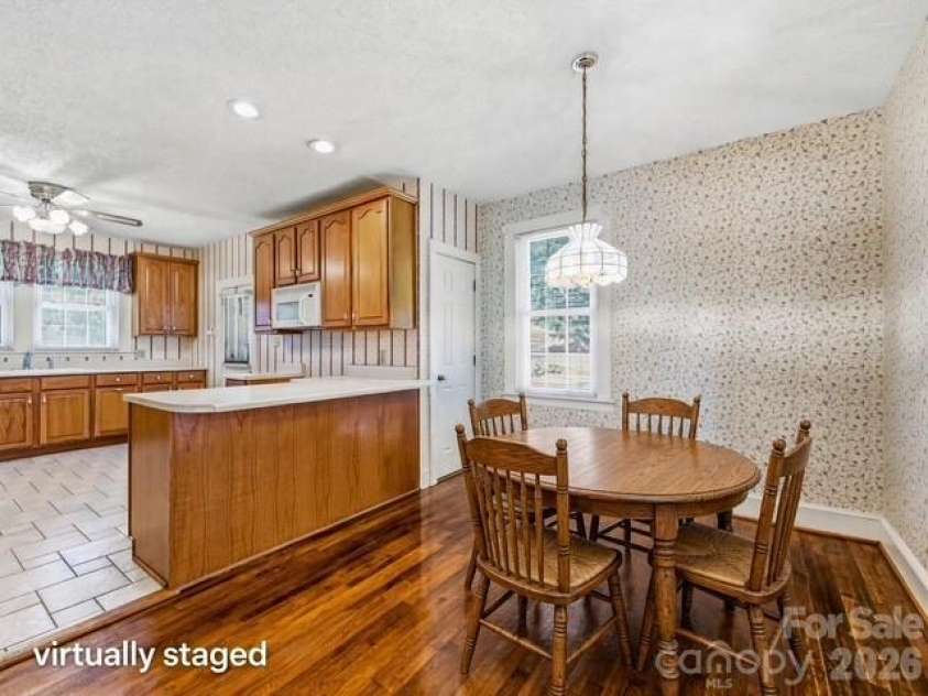1308 Charlotte Highway, Fairview, NC 28730.  MLS# CAR4429052, YatesRealty ID 53437. Breakfast table area