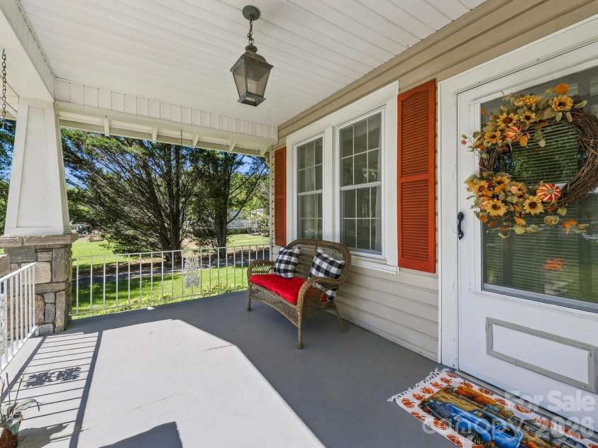 1308 Charlotte Highway, Fairview, NC 28730.  MLS# CAR4429052, YatesRealty ID 53437. Covered Porch