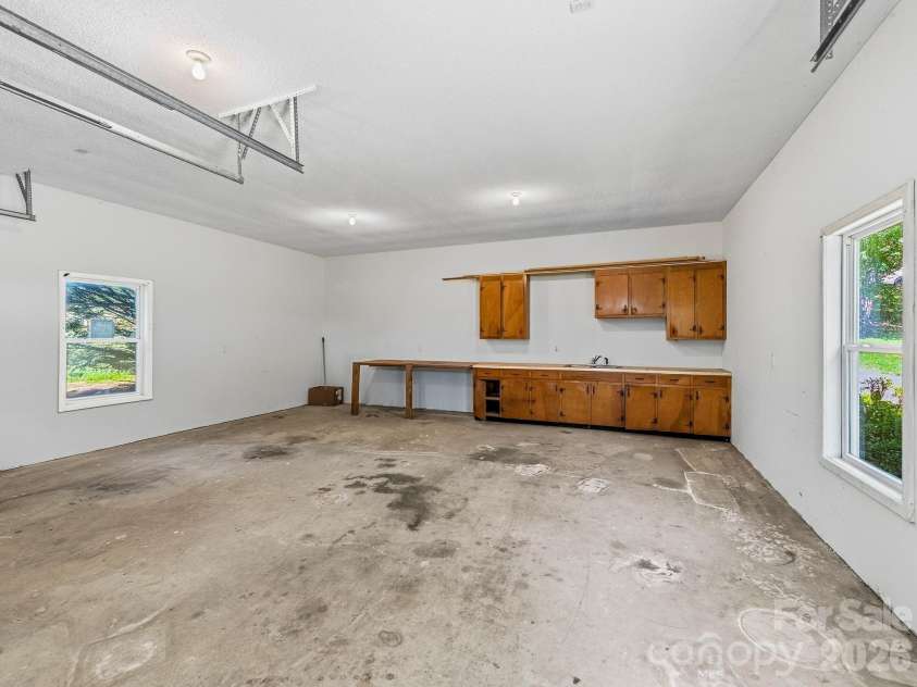 1308 Charlotte Highway, Fairview, NC 28730.  MLS# CAR4429052, YatesRealty ID 53437. Huge garage