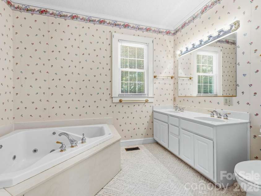 1308 Charlotte Highway, Fairview, NC 28730.  MLS# CAR4429052, YatesRealty ID 53437. Primary bathroom
