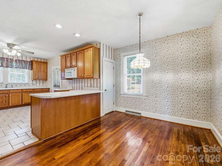 1308 Charlotte Highway, Fairview, NC 28730.  MLS# CAR4429052, YatesRealty ID 53437. Real hardwood floors