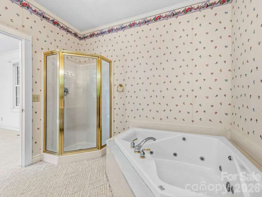 1308 Charlotte Highway, Fairview, NC 28730.  MLS# CAR4429052, YatesRealty ID 53437. Separate tub and shower