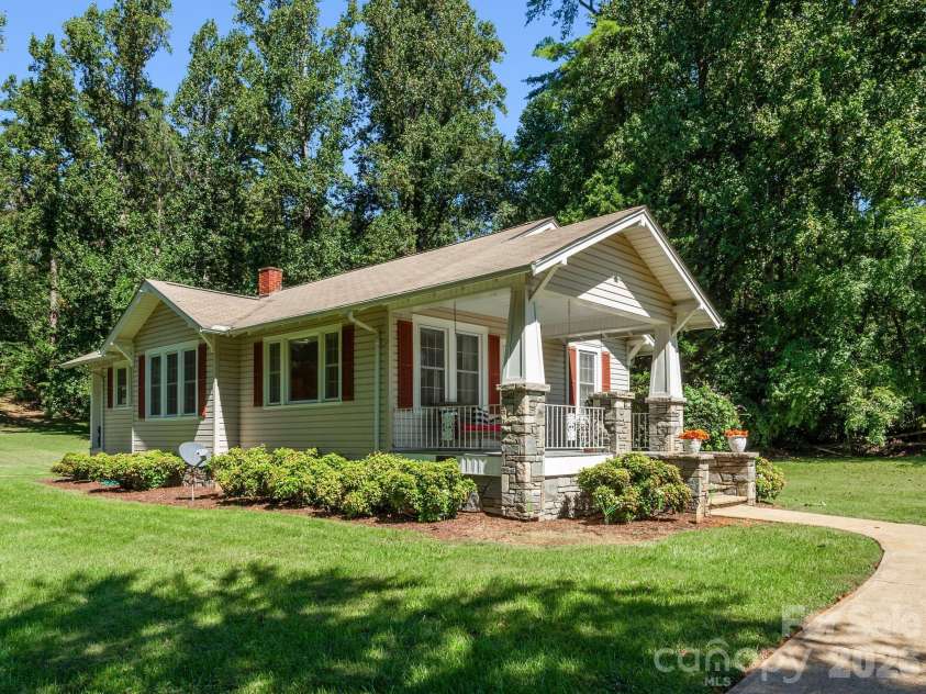 1308 Charlotte Highway, Fairview, NC 28730.  MLS# CAR4429052, YatesRealty ID 53437. Side View