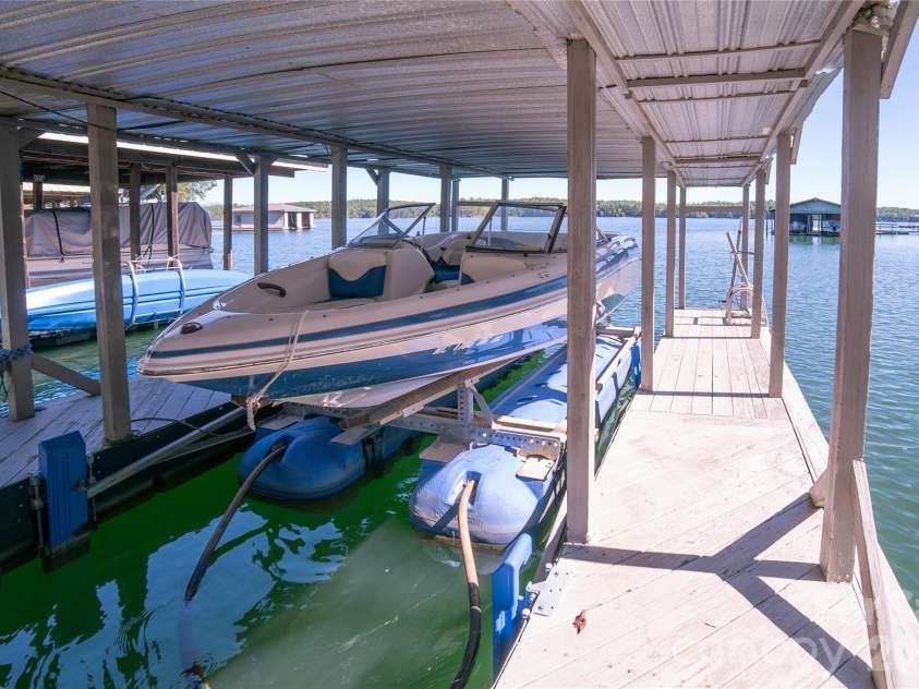 2231 Point Drive, Nebo, NC 28761.  MLS# CAR4428841, YatesRealty ID 53439. Dock with lift