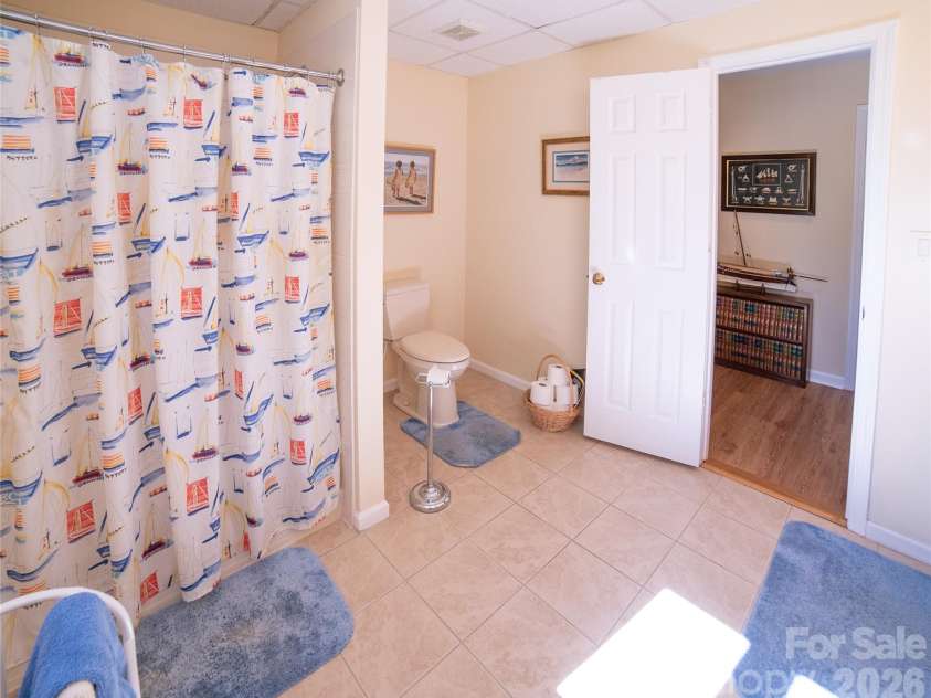 2231 Point Drive, Nebo, NC 28761.  MLS# CAR4428841, YatesRealty ID 53439. Downstairs full bath