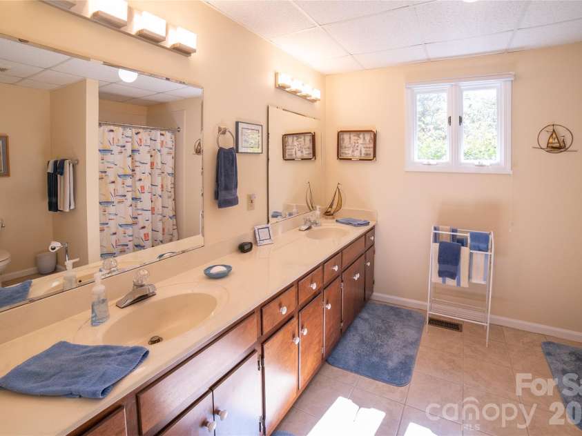 2231 Point Drive, Nebo, NC 28761.  MLS# CAR4428841, YatesRealty ID 53439. Downstairs full bath