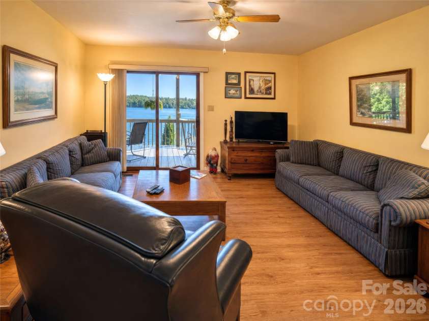 2231 Point Drive, Nebo, NC 28761.  MLS# CAR4428841, YatesRealty ID 53439. Downstairs living room