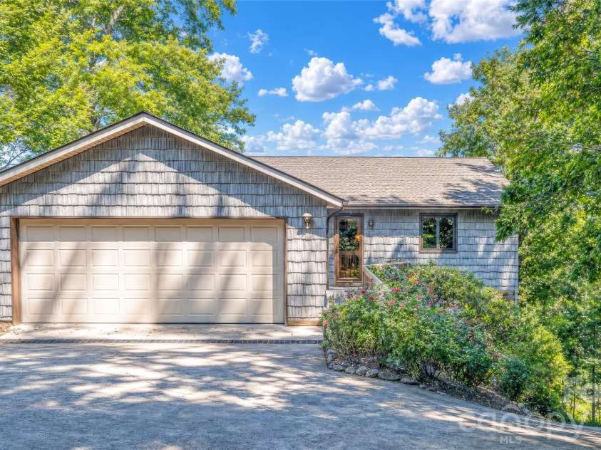 2231 Point Drive, Nebo, NC 28761.  MLS# CAR4428841, YatesRealty ID 53439. Driveway side