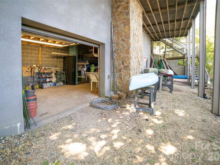 2231 Point Drive, Nebo, NC 28761.  MLS# CAR4428841, YatesRealty ID 53439. Lake level storage/workshop