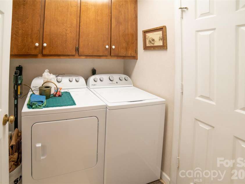 2231 Point Drive, Nebo, NC 28761.  MLS# CAR4428841, YatesRealty ID 53439. Laundry on main to full bath