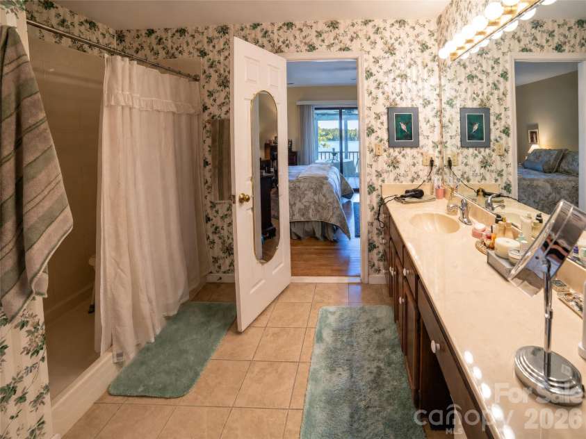 2231 Point Drive, Nebo, NC 28761.  MLS# CAR4428841, YatesRealty ID 53439. Primary bath
