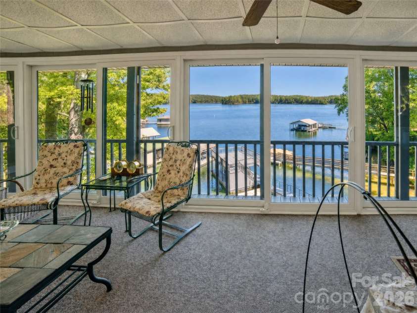 2231 Point Drive, Nebo, NC 28761.  MLS# CAR4428841, YatesRealty ID 53439. Sunroom