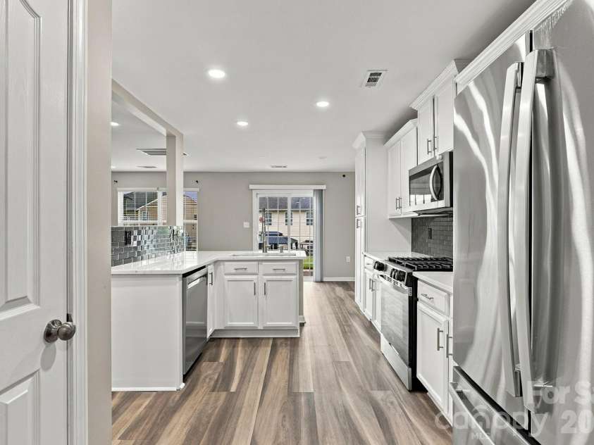 2204 Reid Pointe Avenue, Indian Land, SC 29707.  MLS# CAR4427335, YatesRealty ID 53455. Kitchen (Pantry on left)