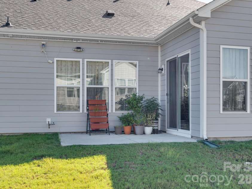 3467 Calico Branch Road, Indian Land, SC 29707.  MLS# CAR4428940, YatesRealty ID 53459. Back Patio