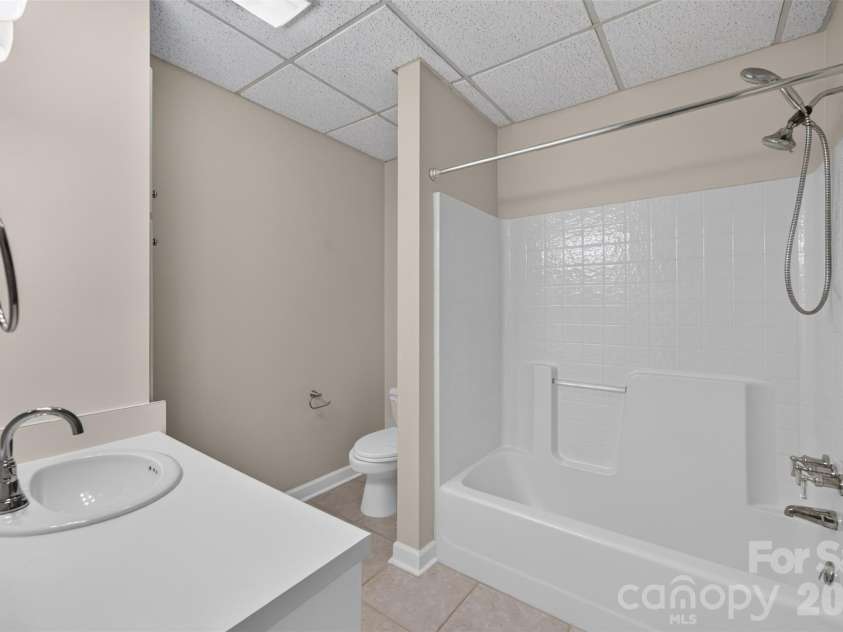 1058 13th Avenue Place, Hickory, NC 28601.  MLS# CAR4429107, YatesRealty ID 53463. Basement Bathroom