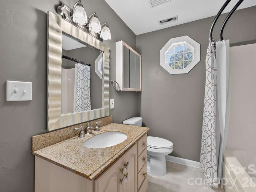 1058 13th Avenue Place, Hickory, NC 28601.  MLS# CAR4429107, YatesRealty ID 53463. En-suite bathroom