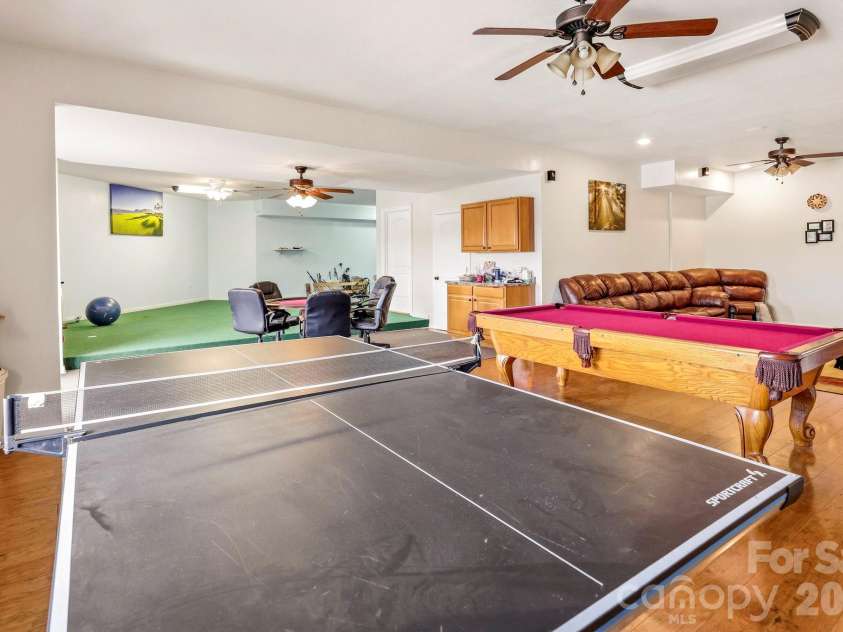 671 Mud Cut Loop, Marion, NC 28752.  MLS# CAR4426296, YatesRealty ID 53470. Basement Game room