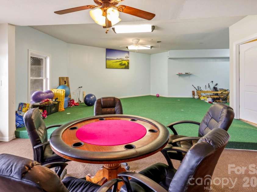 671 Mud Cut Loop, Marion, NC 28752.  MLS# CAR4426296, YatesRealty ID 53470. Basement Game room