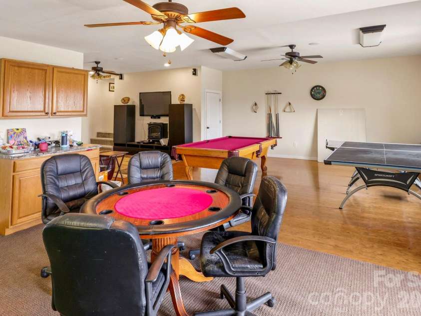 671 Mud Cut Loop, Marion, NC 28752.  MLS# CAR4426296, YatesRealty ID 53470. Basement Game room