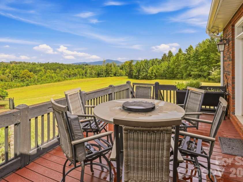 671 Mud Cut Loop, Marion, NC 28752.  MLS# CAR4426296, YatesRealty ID 53470. Main Level Deck