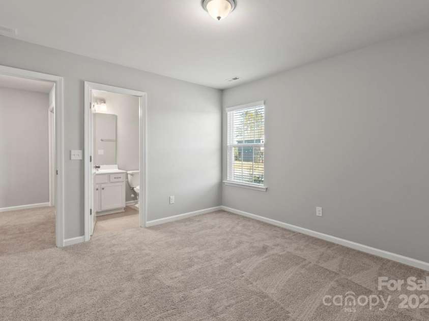 2031 Killian Creek Drive, Denver, NC 28037.  MLS# CAR4241758, YatesRealty ID 5349. Bedroom 5 features an ensuite bath