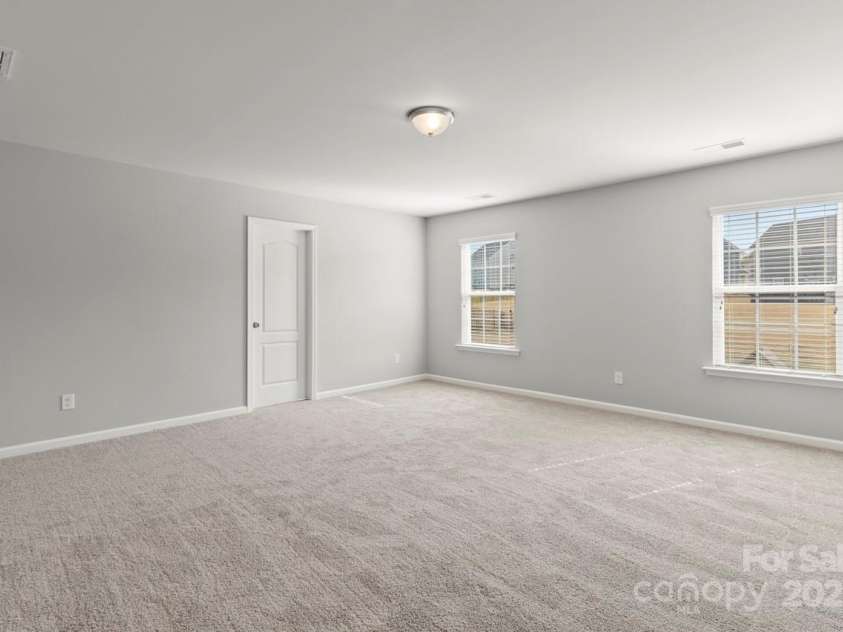 2031 Killian Creek Drive, Denver, NC 28037.  MLS# CAR4241758, YatesRealty ID 5349. Super spacious primary bedroom