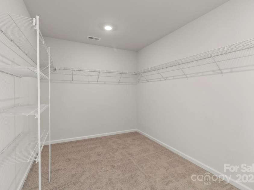 2031 Killian Creek Drive, Denver, NC 28037.  MLS# CAR4241758, YatesRealty ID 5349. Your clothes have found their new home in the large primary closet