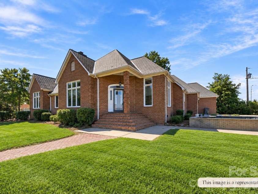 100 Country Creek Drive, Kings Mountain, NC 28086.  MLS# CAR4428896, YatesRealty ID 53498. This image is a representation. Lawn digitally enhanced.