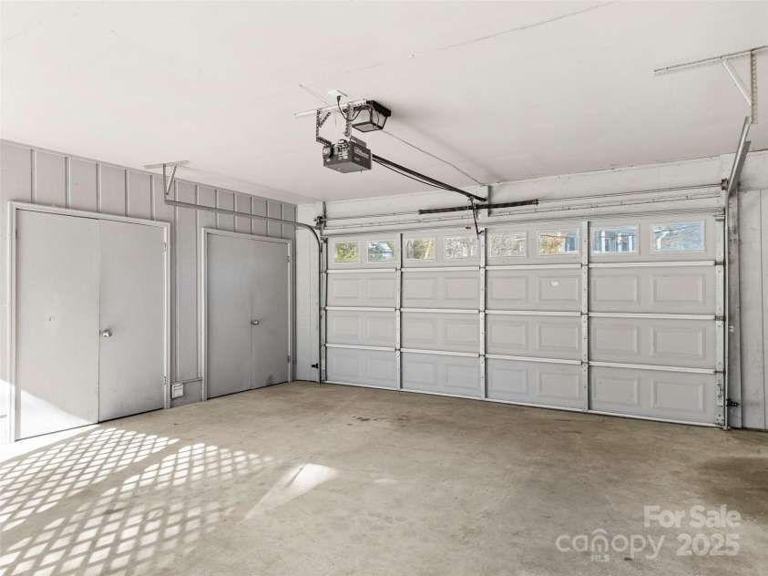 550 Kinross Drive, Flat Rock, NC 28731.  MLS# CAR4215035, YatesRealty ID 535. Carport with laundry and utility area