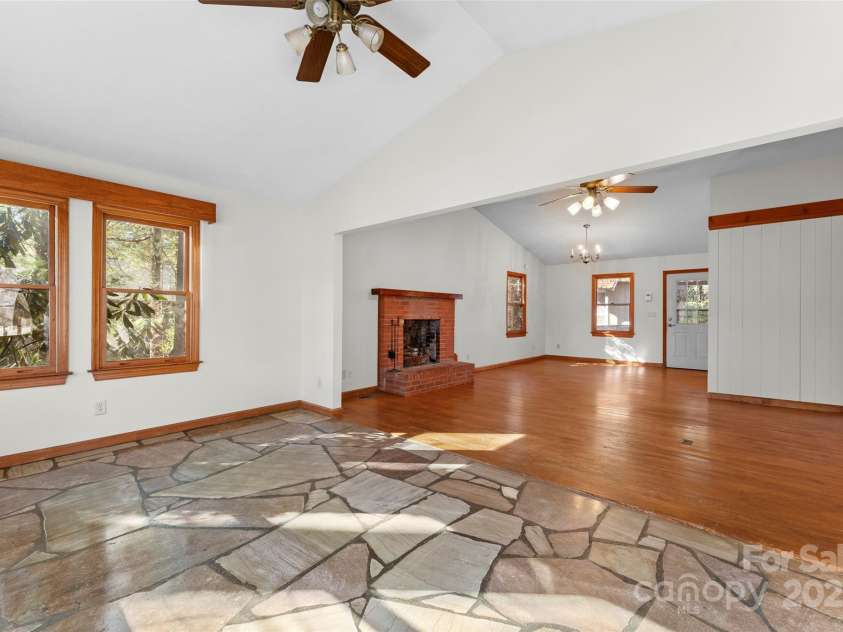 550 Kinross Drive, Flat Rock, NC 28731.  MLS# CAR4215035, YatesRealty ID 535. Sunroom off Great Room