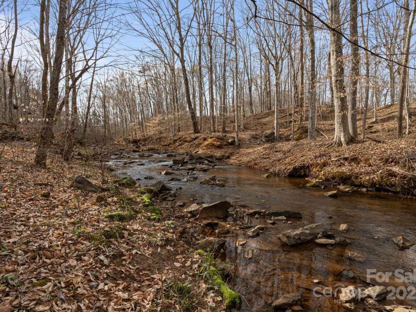 3196 Stonemill Path, Sherrills Ford, NC 28673.  MLS# CAR4235401, YatesRealty ID 5350. PATHWAY FROM BACKYARD LEADING  TO CREEK