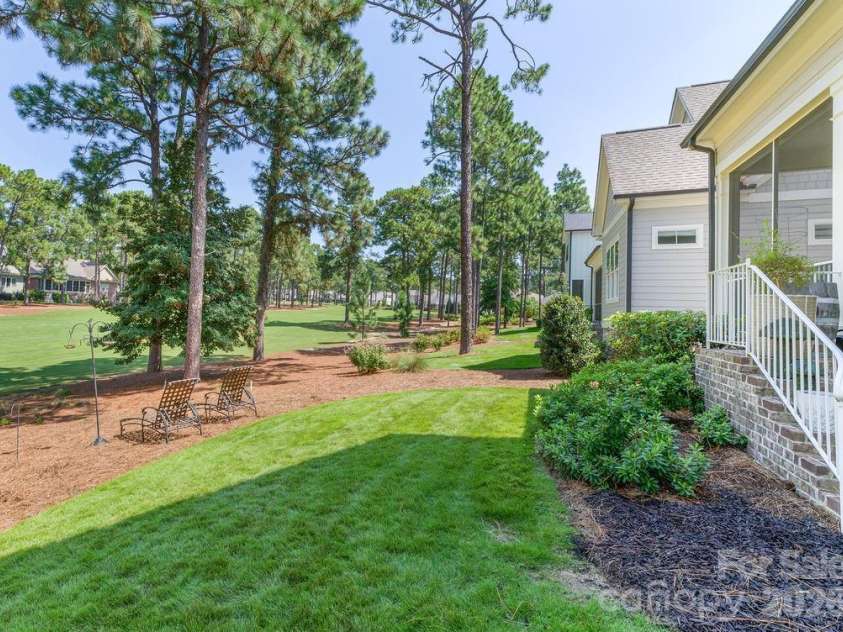 16 Bally Bunion Lane, Pinehurst, NC 28374.  MLS# CAR4429084, YatesRealty ID 53503. Back Yard on 18th hole of Golf Course