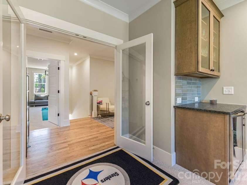 16 Bally Bunion Lane, Pinehurst, NC 28374.  MLS# CAR4429084, YatesRealty ID 53503. Large Den Area with Half Bath