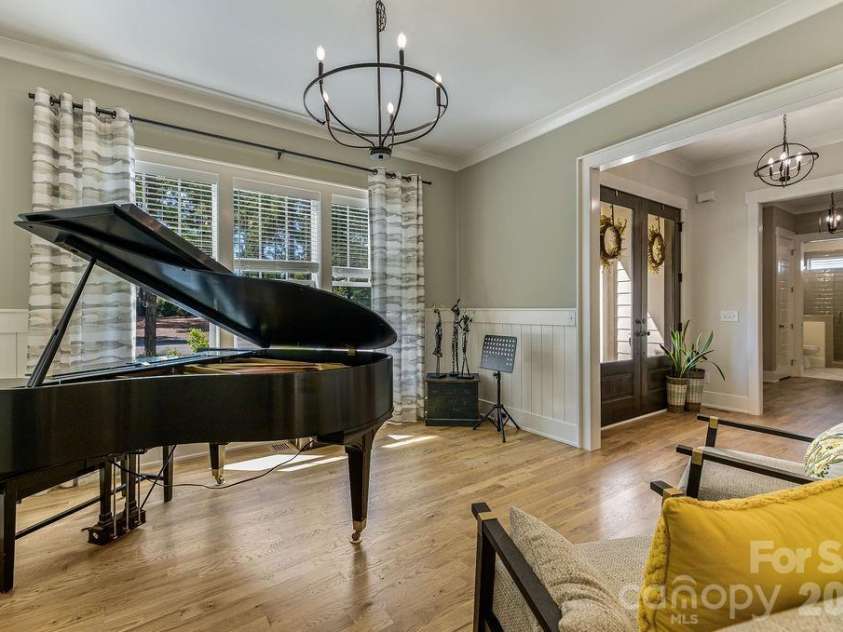 16 Bally Bunion Lane, Pinehurst, NC 28374.  MLS# CAR4429084, YatesRealty ID 53503. Large Dining Room currently used for music