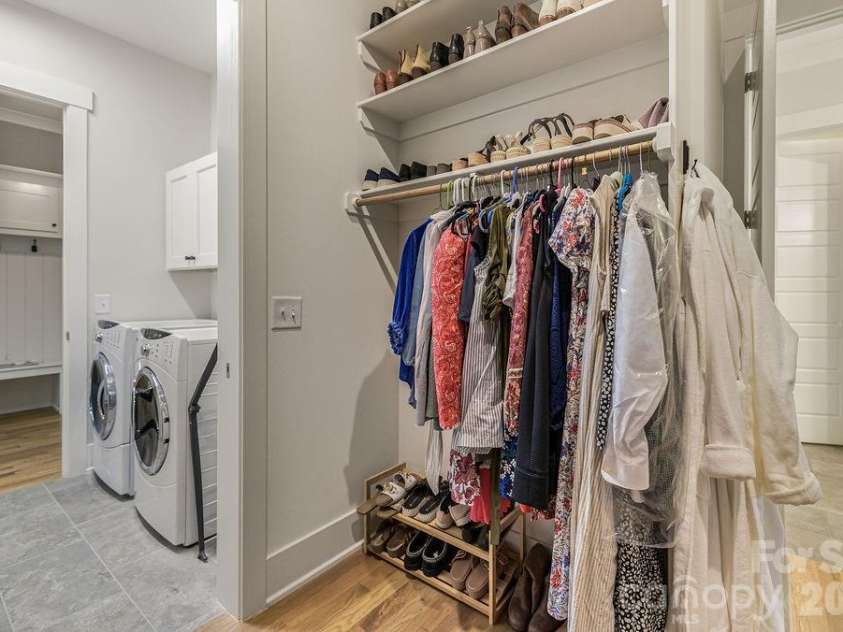 16 Bally Bunion Lane, Pinehurst, NC 28374.  MLS# CAR4429084, YatesRealty ID 53503. Master Closet adjacent to Laundry Room