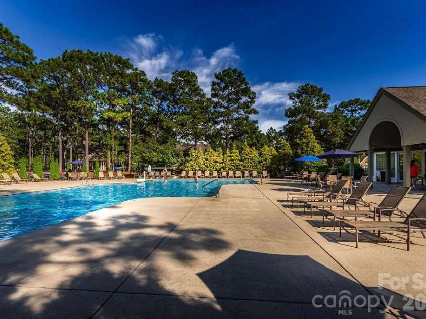 16 Bally Bunion Lane, Pinehurst, NC 28374.  MLS# CAR4429084, YatesRealty ID 53503. Pinehurst National Pool Complex