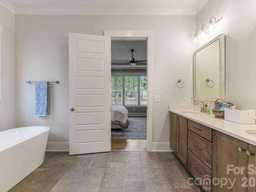 16 Bally Bunion Lane, Pinehurst, NC 28374.  MLS# CAR4429084, YatesRealty ID 53503. Primary bath with soaking Tub