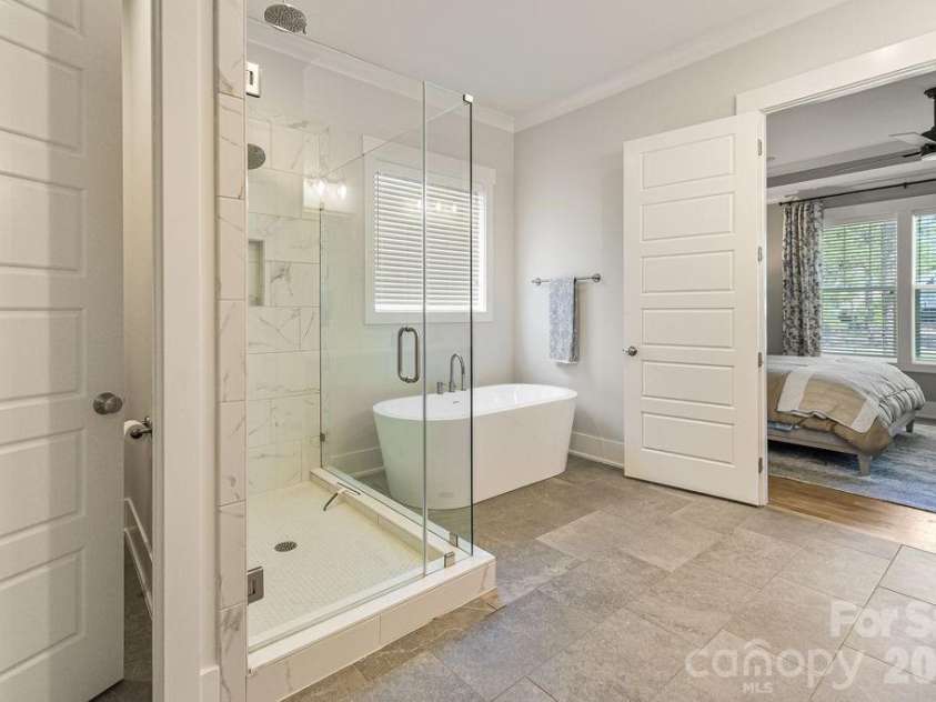16 Bally Bunion Lane, Pinehurst, NC 28374.  MLS# CAR4429084, YatesRealty ID 53503. Shower and Soaking tub