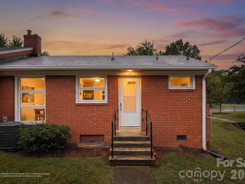 4206 Randolph Road, Charlotte, NC 28211.  MLS# CAR4422811, YatesRealty ID 53508. Twilight rear exterior